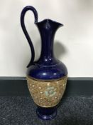 A Royal Doulton Lambeth blue and gilt jug height 36 cm