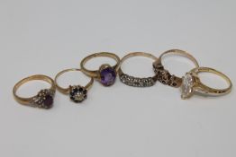A 9ct gold amethyst and diamond ring, another 9ct gold amethyst set ring,