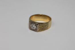 A heavy 18ct gold solitaire ring set with an old cut diamond, size T/U, 12.