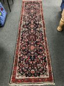 A North West Persian runner 304 cm x 80 cm