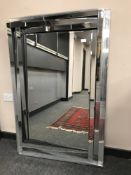 A contemporary all glass mirror