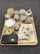 A tray containing a boxed camera, a boxed pocket compass,