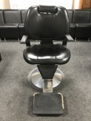 A hydraulic barber's chair