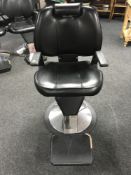 A hydraulic barber's chair