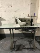 A Brother industrial sewing machine in table