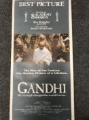 A collection of 20th century movie posters including 'Bad Mans River', 'Broadcast News',