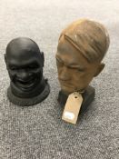 A cast metal bust of Hitler, together with a cast metal, salted peanuts,