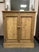 A reclaimed pine double door cabinet,