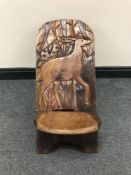 A carved African chair
