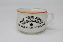 A small novelty Fieldings ash pot 'Flip your ashes on Old Nasty, The Violation of Poland',