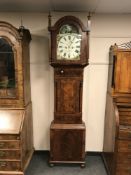 A Victorian mahogany long cased clock with painted dial by Thomas Sewell Newcastle,