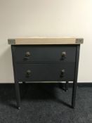 A painted oak two drawer chest with a pine butcher's block top