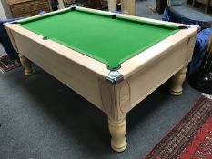 An Ascot six foot pool table, slate bed, not coin operated, complete with novelty 8 ball que stand,