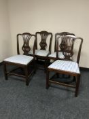 A set of four Victorian mahogany dining chairs