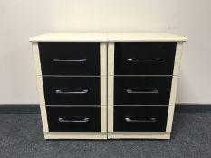 A pair of contemporary beech effect three draw bedside chests