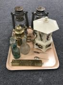 A tray of musical cigarette holder in the form of a pagoda, vintage class bottles,