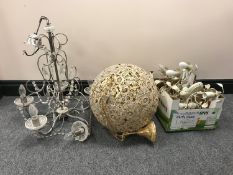 A brass ball light fitting with glass drops,