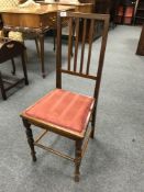 An antique mahogany bedroom chair
