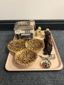 A tray of Thornton's limited edition money box, a lion figure on plinth, Chinese foo dog ornaments,