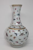 A Chinese porcelain 'butterfly' baluster vase, bears Guangxu mark,