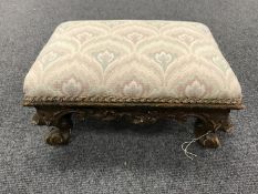 A 19th century gilt wood footstool,