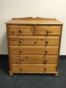 A pine six drawer chest