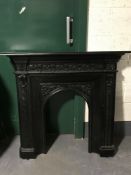 A cast iron fire insert