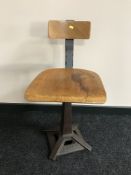 A Singer adjustable machinist's chair