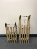 A Pilz-Davos wooden sledge and one other