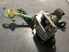 A Ryobi RSV3100E petrol garden vac,