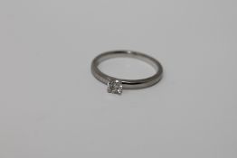 A platinum diamond solitaire ring,