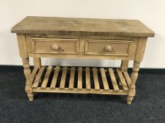 A reclaimed pine kitchen preparation table,