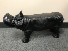 A pottery garden figure of a hippo