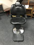 A hydraulic barber's chair
