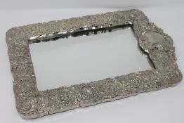 An ornate dressing table easel mirror