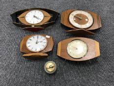 Four mid 20th century mantel clocks and an onyx table lighter