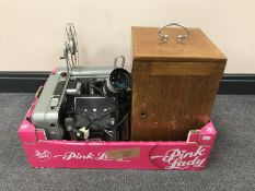 A box containing a French microscope in a fitted mahogany box together with assorted cine cameras