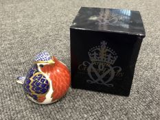 A boxed Royal Crown Derby china paperweight,