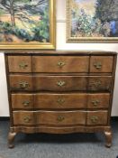 A 19th century oak four drawer chest,