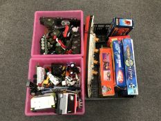 Three boxes containing assorted die cast vehicles, military vehicles, a model of the HMS Titanic,