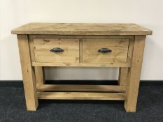A reclaimed pine kitchen preparation table fitted two drawers