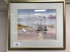 A gilt framed watercolour study depicting a fishing boat at sea,