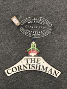 Two cast metal plaques 