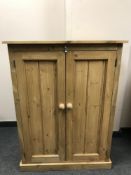 A reclaimed pine double door cabinet,