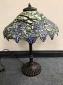 A Tiffany style table lamp with shade CONDITION REPORT: This lamp has two bulb
