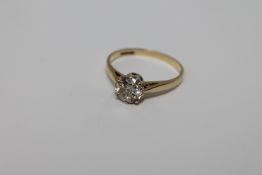 An 18ct gold solitaire diamond ring, the brilliant cut stone weighing an estimated 1.