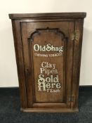 A Georgian and later oak hanging corner cupboard 
