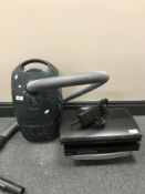 A Virgin media box with remote,