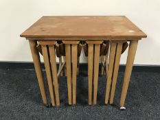 A teak nest of five tables