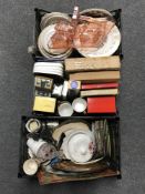 Three boxes containing wall plates, souvenir plates, tins, coronation items,